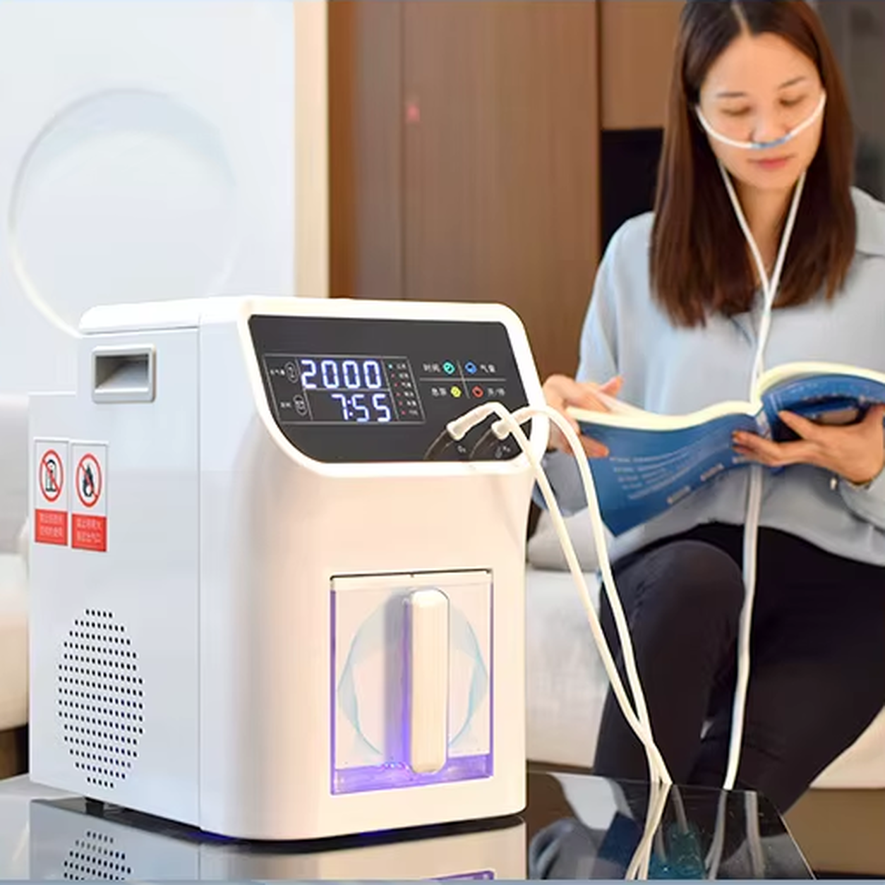 Adult using a Cawolo HIM-19-3000 hydrogen and oxygen system while reading